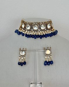 Sabyasachi Inspired Victorian Finish Dual Tone Uncut Polki Foil Kundan Choker Set with Pearls - Sapphire Blue Luxury Blue Kundan Jewelry, Blue Kundan Necklace For Reception Festivities, Blue Kundan Necklace For Festive Reception, Blue Kundan Necklace For Reception And Festive Occasions, Festive Blue Kundan Necklace With Cutdana, Blue Kundan Necklace For Party Festivals, Blue Kundan Necklace For Festive Party, Blue Kundan Necklace For Festivals And Parties, Festive Blue Kundan Necklace For Party