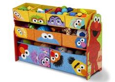 the sesame street toy organizer is colorfully decorated with cartoon character images and characters on it's sides