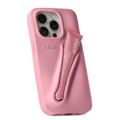 an iphone case with a pink handle and two cell phones on it, one is holding a