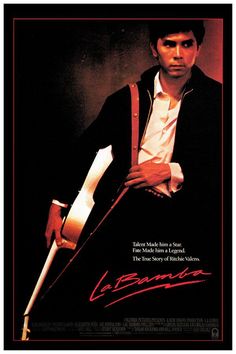 a movie poster with a man holding a guitar