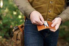 Our rustic leather compact wallets are practical, unadorned, and proudly made in the USA. Each is crafted from full grain cowhide and precision stitched. The Helko Werk crown is burn stamped impressively on the top side. No excessive lining, snaps, or plastic sleeves are used. The leather is soft and pliable, and will begin developing a saddle tan patina in a matter of weeks. This wallet is compact, slim, and designed mostly for carrying cards, and some cash.DimensionsOpen: 5" x 4"Folded: 4" x 2 Leather Trifold Wallet With Waxed Finish, Hand Tooled Leather Wallets For Everyday Use, Leather Trifold Wallet With Waxed Finish For Everyday Use, Artisan Hand Tooled Wallet For Everyday Use, Artisan Hand-tooled Wallets For Everyday Use, Rustic Bifold Wallets For Everyday Use, Hand Tooled Leather Trifold Wallet For Everyday Use, Leather Trifold Wallet Hand Tooled For Everyday Use, Leather Hand Tooled Trifold Wallet For Everyday Use