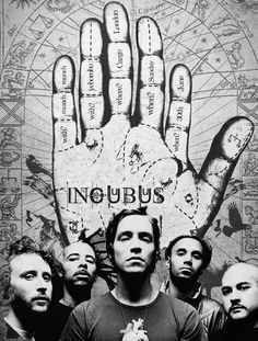 a group of men standing next to each other in front of a hand with words on it