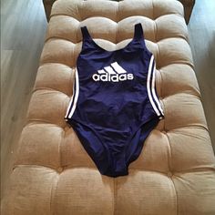 New, With Tags This Navy Blue Swimsuit Has White Stripes. Blue Sports Bodysuit For Summer, Blue Bodysuit For Sports And Summer, Blue Bodysuit For Sports In Summer, Blue Summer Sports Bodysuit, Blue Summer Bodysuit For Sports, Navy Blue Swimsuit, Adidas Swimsuit, Blue Swimsuit, Womens Swim