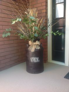 a potted plant is sitting on the porch