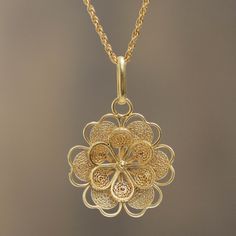 Crafted of sterling silver filigree and bathed in 21k gold, a rose becomes a lacy, feminine necklace. Giuliana Valz-Gen crafts the dazzling flower necklace by hand. 21k gold plated & sterling silver Rope chain Spring ring clasp High polish finish Handmade in Peru Picture Pendant Necklace, Feminine Necklace, Filigree Jewelry, Gold Pendant Jewelry, Silver Jewels, Sterling Silver Filigree, Bridal Gold Jewellery, Silver Filigree, Simple Jewelry