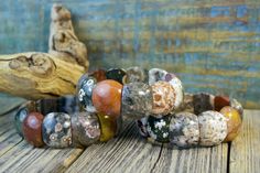 Ocean Jasper Dome Bead Bracelet Earthy Jasper Beaded Bracelet With Natural Stones, Earthy Jasper Beaded Bracelets With Natural Stones, Earthy Beaded Bracelets With Natural Jasper Stones, Earthy Handmade Stretch Bracelet With Round Beads, Earthy Multicolor Beaded Bracelets With Natural Stones, Earthy Multicolor Beaded Bracelet With Natural Stones, Earthy Handmade Stretch Bracelet, Earthy Jasper Gemstone Bead Bracelets, Earthy Jasper Gemstone Beads Bracelet