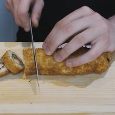 a person cutting up food with a knife