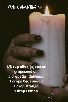 a person holding a lit candle with text describing how to use an oil for candles