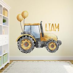 a wall decal with an image of a tractor and some balloons on it that says i am