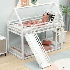 If you are choosing a multifunctional bunk bed, this will be your best choice. This twin over twin bunk bed can provide two people to rest. We have two kinds of beds for you to choose from. One has a slide and another does not. The slide enables your kids to slide down directly from the upper bed, combining entertainment and practicality. Solid metal legs and a strong, durable metal frame ensure stability and durability for long-term use. Slat kit included so box springs are not required. This b Twin House, Bed With Ladder, House Bunk Bed, Bunk Bed With Slide, Twin Over Twin Bunk Bed, Twin Bunk Bed, Box Springs, Bedroom White, Bed With Slide