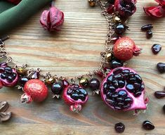 Original bright charm bracelet with pomegranates and beads of garnet, golden and red crystal glass. Pomegranates are made of polymer clay, seeds - natural garnet. Garnet pomegranates) An unusual gift for any holiday for you or your special woman! Garnet is a stone for those who were born in January Persephone Symbol, Red Gemstone Jewelry, Fruit Bracelet, Pomegranate Necklace, Pomegranate Earrings, Pomegranate Jewelry, Red Luxury, Fruit Jewelry, Polymer Earrings