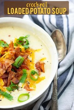 a bowl of loaded potato soup with bacon, green onions and cheese on the side