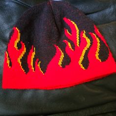 This Is A New Without Tags, Super Cool Hot Topic Kids Size Beanie With Flames. This Is Made In The Usa Acrylic, Nylon Blend With Lots Of Stretch. This Is A Double Layer Beanie To Keep Little Heads Extra Warm On Those Cold Fall And Winter Days And Nights. This Is 10" Across, Making It Approximately 20" In Circumference Unstretched. Please Ask Questions And Make An Offer. I Can't Say Yes If You Don't Ask!