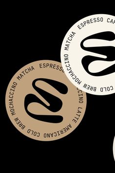 three white and black circular stickers with the words espresso cafe on them