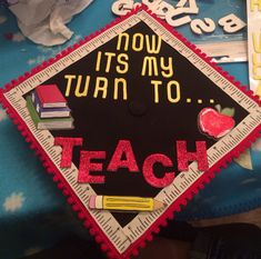 a graduation cap that says now it's my turn to teach