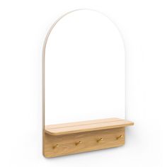 Hold it  ah, the function of the Williams shelf, so deftly described. This low-profile shelf is great for keeping your entryway clutter-free and nicely styled. Topped off with an arched mirror, you can sort those stray hairs as you run out the door, too. Made from solid wood and finished with brushed brass hooks, and finished with a not-too-big ledge to combat the urge to dump everything at the door. Shelf And Mirror, Minimalist Style Home, Shelf Mirror, Mirror Shelf, Shelf Hooks, Ledge Shelf, Wall Mirror With Shelf, Brass Hooks, Arched Mirror