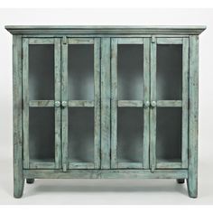 an old wooden cabinet with glass doors on the front and bottom shelves, isolated against a white background