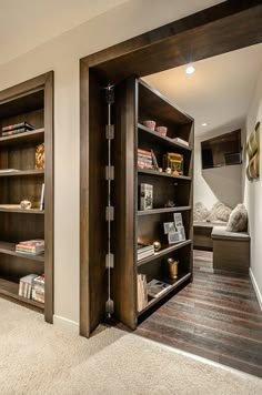 an open bookcase in the corner of a room