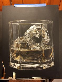 a glass with some ice cubes in it