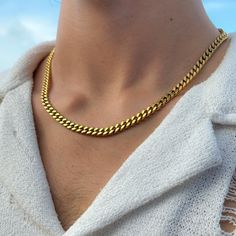 Elevate your style with JVillion Jewelry's Gold Cuban Chain (5mm). Crafted for the modern man, this necklace combines luxury and strength for a must-have accessory. Cuban Gold Chain For Men, Cuban Chain Men, Gold Cuban Chain, Streetwear Jewelry, Luxury Necklace, Jewelry Essentials, Waterproof Jewelry