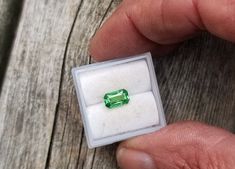 Natural fine green garnet, tsavorite  emerald cut shape for anniversary jewelry, January birthstone for custom made jewelry gift. Color: bright green   size: 7.5x4.5 mm, weight: 1.32 ct. clarity: some very minor inclusions, not noticeable origin: Tanzania All of my gemstones are at wholesale pricing.  I have been a professional gem cutter and wholesale supplier since 1992. Please visit my profile with the Better Business Bureau (you may need to copy and paste the following address to your addres Formal Emerald Cut Tsavorite Gemstone, Green Tourmaline Gemstones For Fine Jewelry, Fine Jewelry Green Tourmaline Gemstones, May Birthstone Gemstones With Accent Stones, May Birthstone Gemstones With Accent Stones For Gifts, Tourmaline Gemstones For Gifts, Fine Jewelry Style, Fine Jewelry Tourmaline Gemstones As Gift, Fine Jewelry Tourmaline Gemstones For Gift, Green Emerald Cut Gemstones For Anniversary