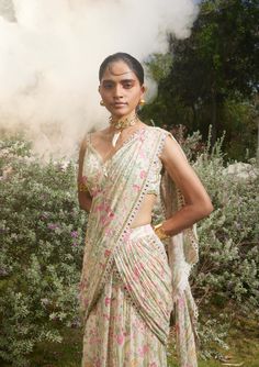 Featuring an ivory pre stitch sari in this signature print paired with hand highlighted blouse and it is embellished using hand embroidered borders. 1950’s Fashion, Women Around The World, Indian Clothing, Custom Bridal, Desi Fashion, Signature Print, Indian Design, The Next Generation, Pink Fabric