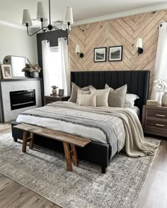 a bedroom with a large bed and wooden walls