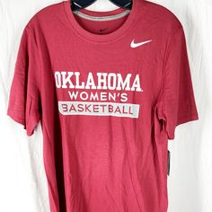 Brand New With Tags! Dri-Fit Oklahoma Woemns Basketball Red Team Spirit Tops With Logo Print, Red Tops With Team Spirit Logo Print, Nike Casual Top In University Red, Nike Casual T-shirt In University Red, Red College Tops With Logo Print, Nike Sporty Tops In University Red, Nike Relaxed Fit College Tops, Nike Sporty University Red Tops, Nike Relaxed Fit Tops For College