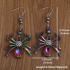 Material: zinc Alloy Earring Type: drop earrings Shape\pattern: Geometric Trendy Alloy Crystal Earrings, Rainbow Dangle Metal Earrings, Multicolor Metal Dangle Crystal Earrings, Rainbow Metal Drop Earrings, Handmade Alloy Earrings For Party, Multicolor Metal Jewelry With Ear Wire, Multicolor Metal Earrings With Ear Wire, Multicolor Metal Ear Wire Earrings, Multicolor Metal Drop Earrings