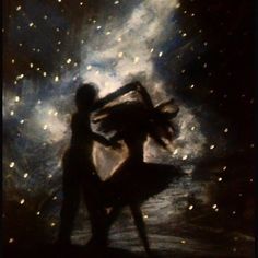 two people are dancing in the dark with stars