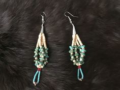 "Authentic Beautiful Native American Indian Jewelry Navajo Hand Beaded Long Dangle Jacla Earrings with Heishi Beads and Kingman Mine Turquoise. Great for a gift❤️ Handcrafted by Navajo Artist R. Sellers These beautiful earrings are 4.25\" in length Jacla is two loops of heishi that were originally earrings and sometimes fastened to the bottom of a stone necklace as a pendant-like attachment. Jacla is Navajo for \"ear string\"." Southwestern Adjustable Dangling Bead Earrings, Southwestern Jewelry With Round Beads For Pierced Ears, Adjustable Southwestern Beaded Earrings, Southwestern Teardrop Beaded Earrings, Traditional Hand-strung Dangle Jewelry, Southwestern Style Drop Earrings, Adjustable Hand-strung Southwestern Beaded Earrings, Indian Jewelry Earrings, American Indian Jewelry