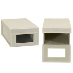 two white boxes with one open and the other closed