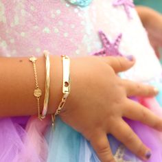 A child's first piece of jewelry should be special. Children's ID bracelets are simple, trendy, and can be personalized as a gift. Precious Metal: 14K Yellow Gold Link: Figaro Link Link thickness 3.8mm ID tag size: 5.4 x 29.8mm Detail: Open Heart Length: 6" Lock: Lobster Lock Other bracelets shown on photos are sold separately Comes in our beautiful gift box Important: Please use the "note box" at checkout (before payment) to let us know the engraving of your favorite font and desired initial(s) 14k Gold Bangle Bracelet, Initial S, Twisted Bangle, Gold Girl, Gold Link, Note Box, Id Bracelets, Gold Bangle Bracelet, Gold Bangle