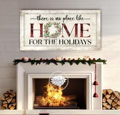 there is no place like home for the holidays wood sign on fireplace mantel with christmas decorations