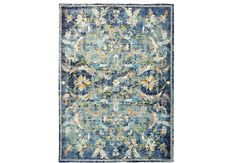 an area rug with blue and yellow colors