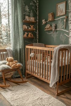 a baby's room with green walls and wooden furniture