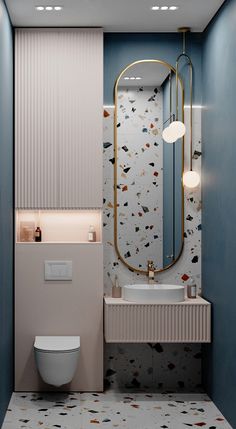 a bathroom with a toilet, sink and mirror in the wall next to each other