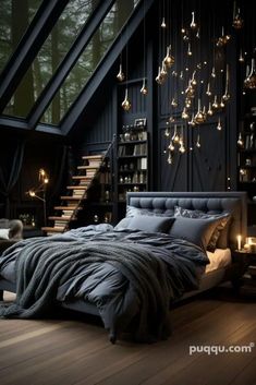 a bedroom with black walls, wooden floors and lots of lights hanging from the ceiling