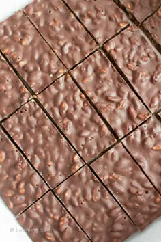 chocolate fudge bars cut into squares on top of each other