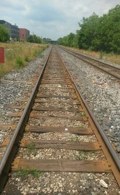 an empty train track with no cars on it