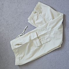 Size M Very Light Ivory Color Adjustable Bottom Brand New-Never Worn, No Tag Measurements: Waist 16.5 " Hips 21.5 " Rise 8.5" Inseam 31" Gap Casual Beige Pants, Casual Beige Gap Pants, Gap Beige Cotton Bottoms, Gap Beige Casual Bottoms, Gap White Cotton Bottoms, White Cotton Bottoms By Gap, Gap White Bottoms With Pockets, White Gap Bottoms With Pockets, Gap Straight Leg Beige Bottoms