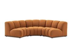 the curved couch is made out of fabric and has four sections on each side, one with