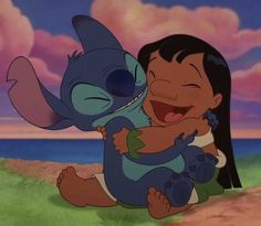 lili and stitch hugging each other in front of the ocean