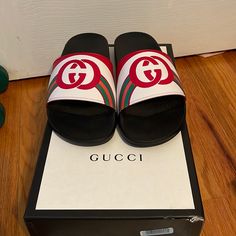 Gucci Logo Multicolor Slides. Mens Size 7. I Am A Womens Size 10 & They Fit Perfectly. Brand New Never Worn! Green, Orange, Red, And White Slide. Comes With Original Box, 2 Shoe Bags, And Original Tags. 100% Authentic. Gucci Black Sneakers With Logo Print, Black Gucci Sneakers With Logo Print, White Flat Gucci Slides, Luxury Red Gucci Slides, Red Gucci Slides With Branded Insole, Red Gucci Slides With Round Toe, White Gucci Slip-on Slides, White Gucci Slip-on Sneakers, Gucci Casual Slip-on Slides