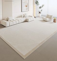 a large white rug in the middle of a room