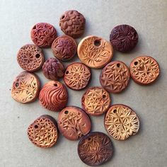 several different types of buttons on a table