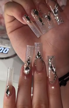 777 Classy Quince Nails, Prom Nails Extravagant, Blinged French Tip Acrylic Nails, Long Square Nails Rhinestones, Natural Acrylic Nails With Rhinestones, Long Gem Acrylic Nails, Simple Clear Acrylic Nails, Mail Designs With Gems, Long Clear Nails With Rhinestones