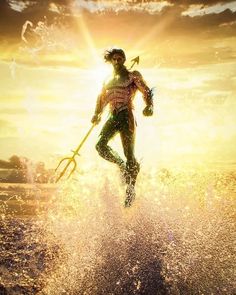 a man is jumping in the air on water skis while holding an oar