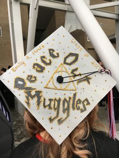 a white and gold graduation cap with the words be awesome on it that says,