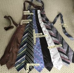 a bunch of ties that are laying on the ground